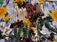 Assorted bundled vintage Christmas light strands with various socket styles and wire colours