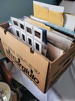 File box showing slides, photos, folders