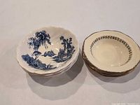 Stacked Johnson Bros. Old Mill cereal bowls beside Alfred Meakin Marigold dessert bowls