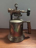 Full view right side of brass blowtorch