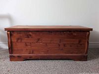 Front view of closed solid cedar blanket box