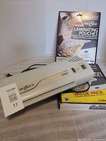 Laminator with two boxes of pouches