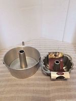 Angel food cake pan and Bundt pan side by side
