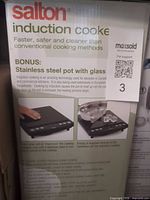 Front of retail box showing Salton induction cooker set and included pot