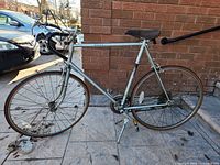 Right side view of complete Medalist road bike showing frame, wheels and kickstand