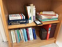 Entire bookshelf showing all books and items