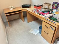 Full view of L-shaped desk showing drawers, keyboard shelf, CPU shelf