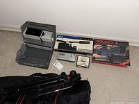 Full layout showing projector, microphone, Solidex kit, radio, PowerPac, and tripod