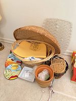 Group view showing baskets, plates, tray, planter and other items