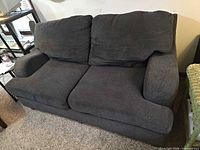 Front view showing cushions and arms