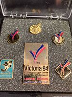Full view of six pins in presentation case
