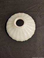 Top view showing ribbed exterior and fitter opening