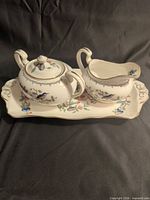 sugar bowl with lid, creamer jug and tray