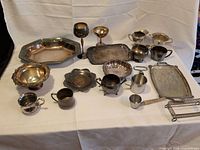 Group shot of all silver-plated items laid out