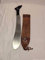 Machete and sheath full view