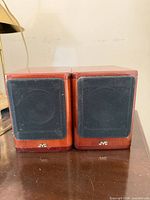Front view of both JVC speakers with grilles attached