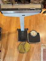 Full view beam scale with two smaller scales on floor