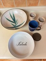 All items together: serving bowl, salad bowl, mug with lid, two goblets