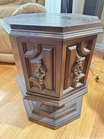 Front view of octagonal table with doors closed