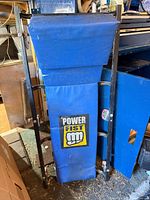 Front view of Power Fist blue padded mechanic creeper folded upright