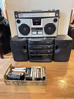 Full view of boombox, component stack, speakers and cassette basket