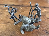 All three pewter figurines front view