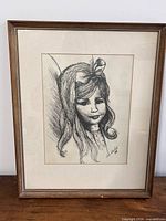 Front view of framed ink drawing