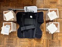 Overall lot showing knee brace, reacher tool, four riser cubes and spacer blocks