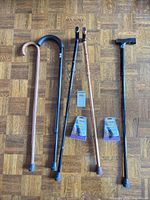 All five canes and two Airgo tip packs laid out