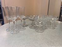 Group shot of all 15 clear glass pieces