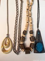 All four necklaces side by side