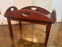 Tray table with sides folded up on base