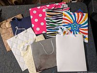 Group shot of nine assorted gift bags