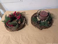 Both grapevine decorations side by side on table