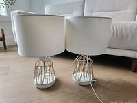 Both lamps side by side to show matching design, shades, bases and cords