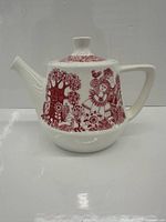 Side view of Figgjo Flint Arden teapot showing red pattern and overall form