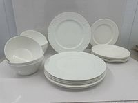 All 18 Mikasa Trellis White pieces grouped