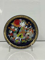 Full view of Wiinblad designed Rosenthal plate on stand