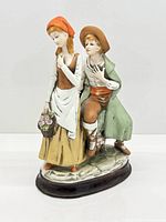 Full front view of porcelain figurine