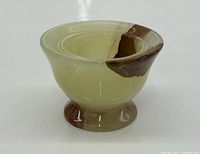 front angle of onyx bowl showing color and shape