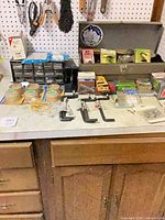 Full view of toolbox, clamps, fasteners, sliders, organizer