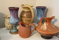 All six pottery pieces grouped