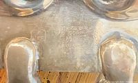 Maker’s mark “English Silver Mfg Corp 63” stamped on underside
