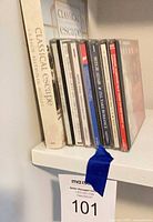 Stack of nine jewel-case CDs with Classical Escape slipcase visible