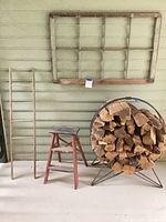 Full lot showing window frame, ladder, stool, log rack