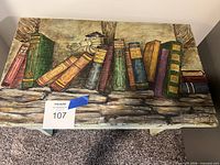 Top view showing painted books and bookworm artwork