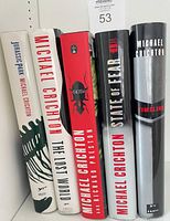 Spine view of all five Michael Crichton hardcovers