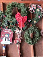 Wreaths, Merry Christmas sign, swag detail