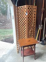 Room divider and nightstand together for scale and context