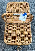 Top view of natural wicker lidded picnic basket